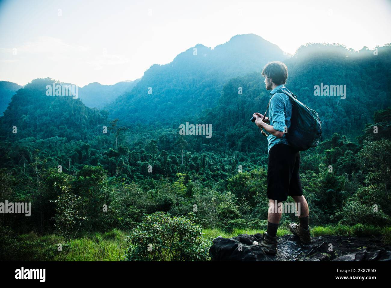 Hiker taking pictures in Phong Pha national park, Vietnam, Southeast Asia Stock Photo
