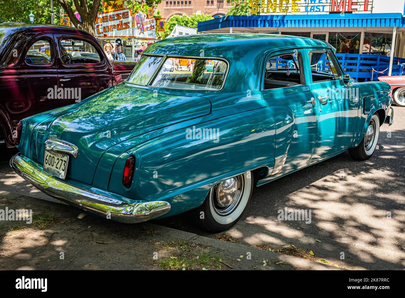 Falcon Heights, MN - June 19, 2022: High perspective rear corner view of a 1950 Studebaker Champion 4 Door Sedan at a local car show. Stock Photo