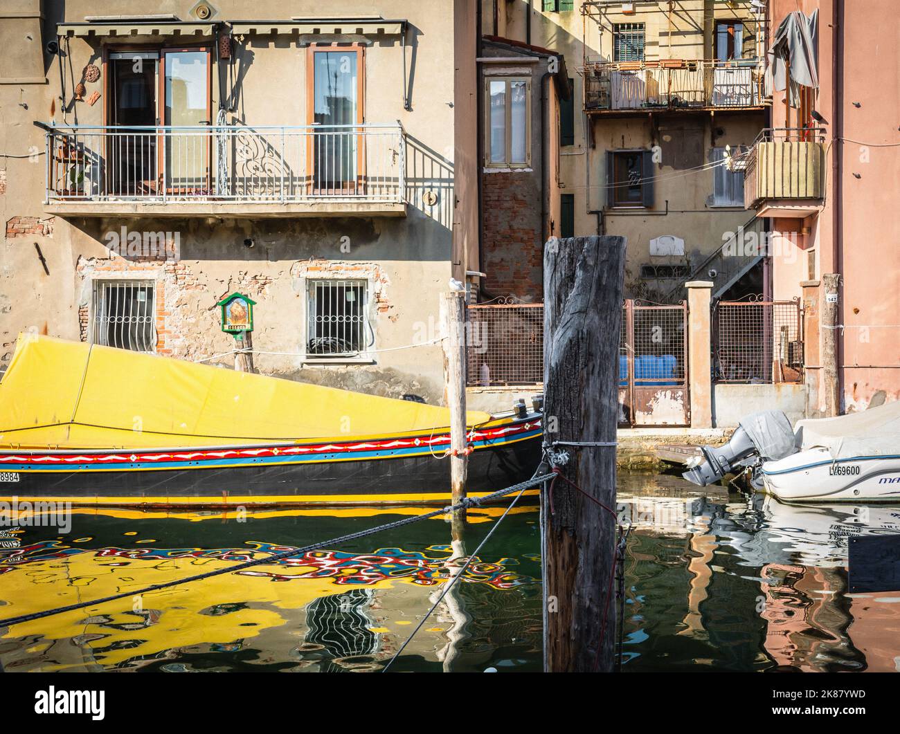 old wooden boat in the Canal, Chioggia town, Venetian Lagoon, Veneto region,northern italy Stock Photo