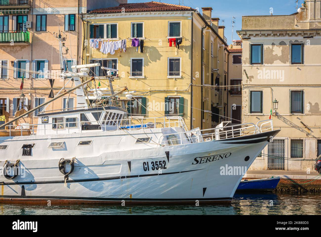 a fishermen boat in the canal Harbour - Chioggia, Venetian Lagoon, Venice province, Veneto district - northern italy Stock Photo