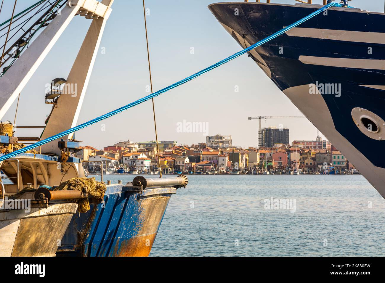 Big fishing boats moored in the port on the Adriatic sea at Chioggia city, Venetian lagoon, Venice province, northern Italy Stock Photo