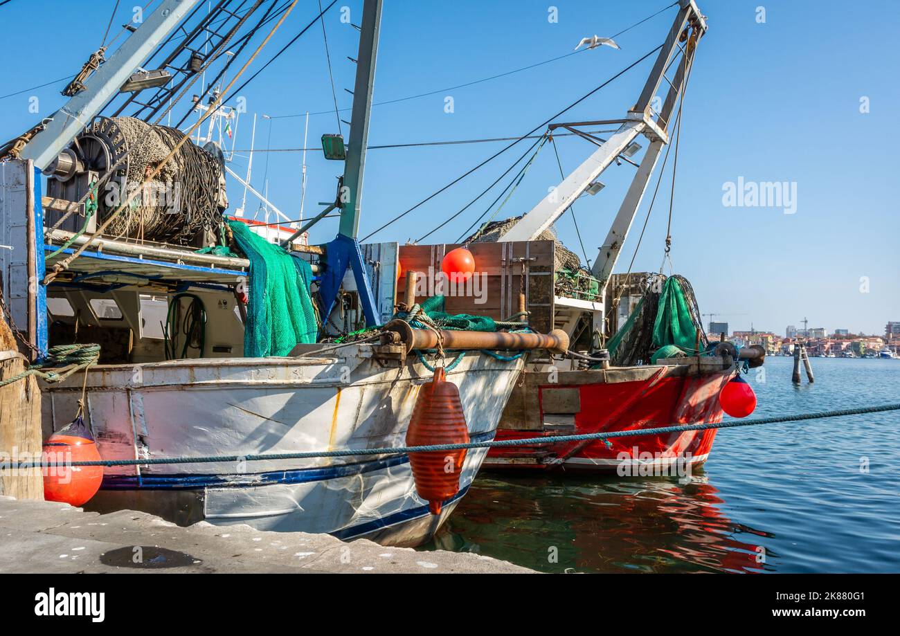 Big fishing boats moored in the port on the Adriatic sea at Chioggia city, Venetian lagoon, Venice province, northern Italy Stock Photo