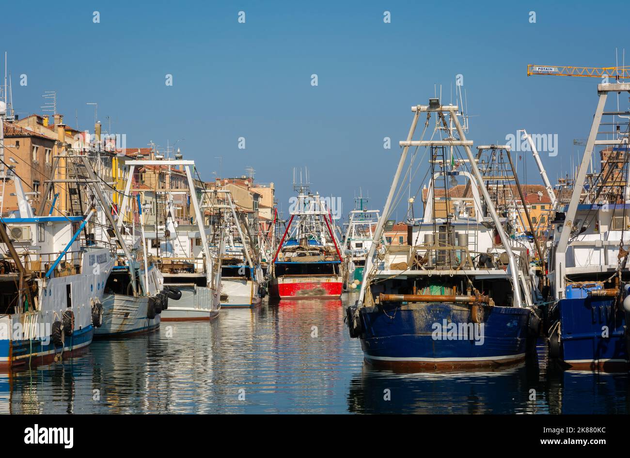 Big fishing boats moored in the port on the Adriatic sea at Chioggia city, Venetian lagoon, Venice province, northern Italy Stock Photo