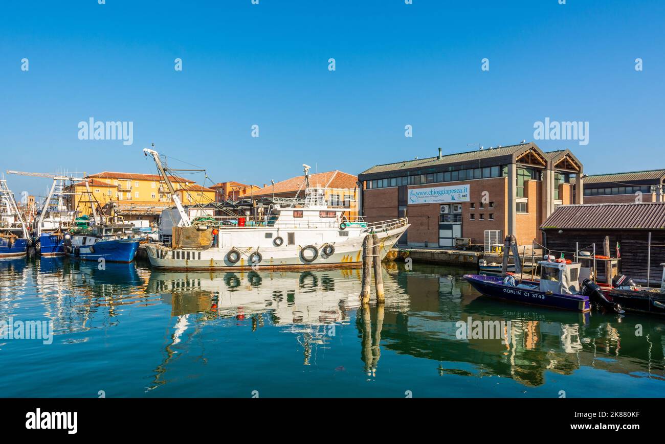 Big fishing boats moored in the port on the Adriatic sea at Chioggia city, Venetian lagoon, Venice province, northern Italy Stock Photo