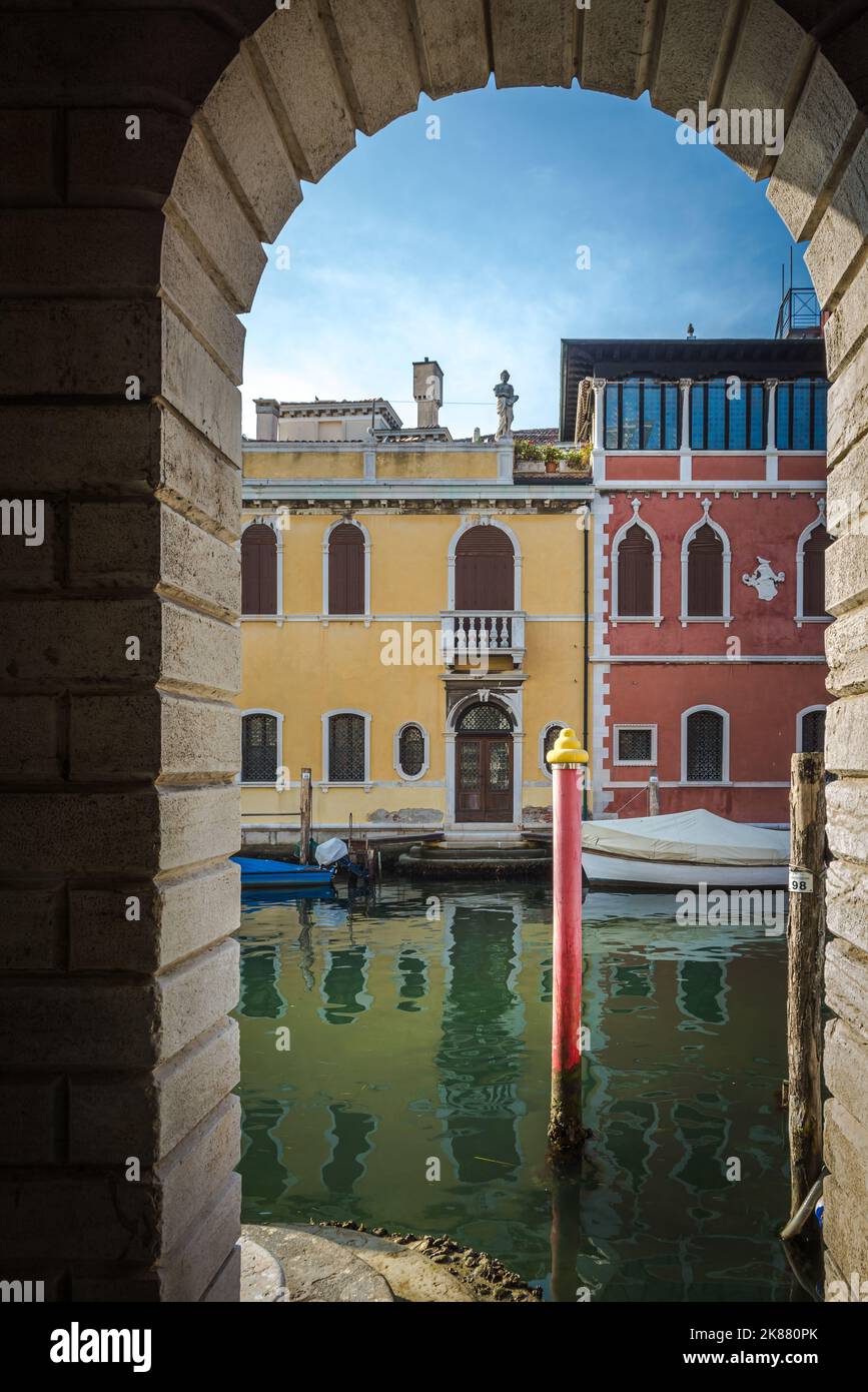 Chioggia glimpse from the arcades along the canals - Chioggia city, Venetian Lagoon, Verona province, Italy - suggestive image of Chioggia Stock Photo