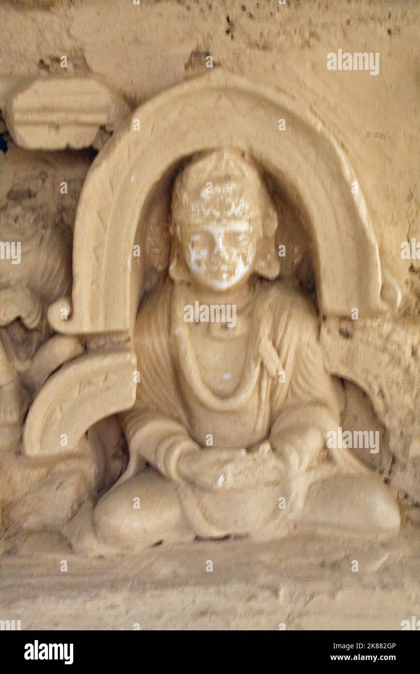 Statue of Buddha in meditation (Gandhara style), Jaulian site,  Taxila, NWFP, Pakistan Stock Photo