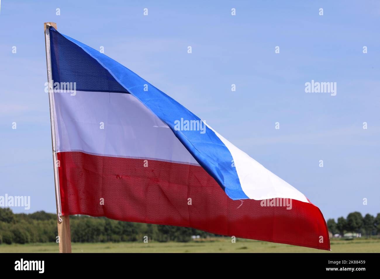 flags upside down in Wezep and Oldebroek with protest farmers signs in