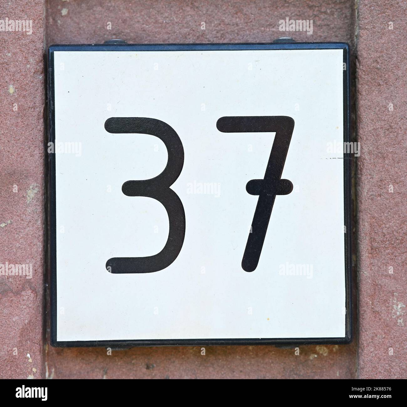 A close up of a house number 37 Stock Photo - Alamy