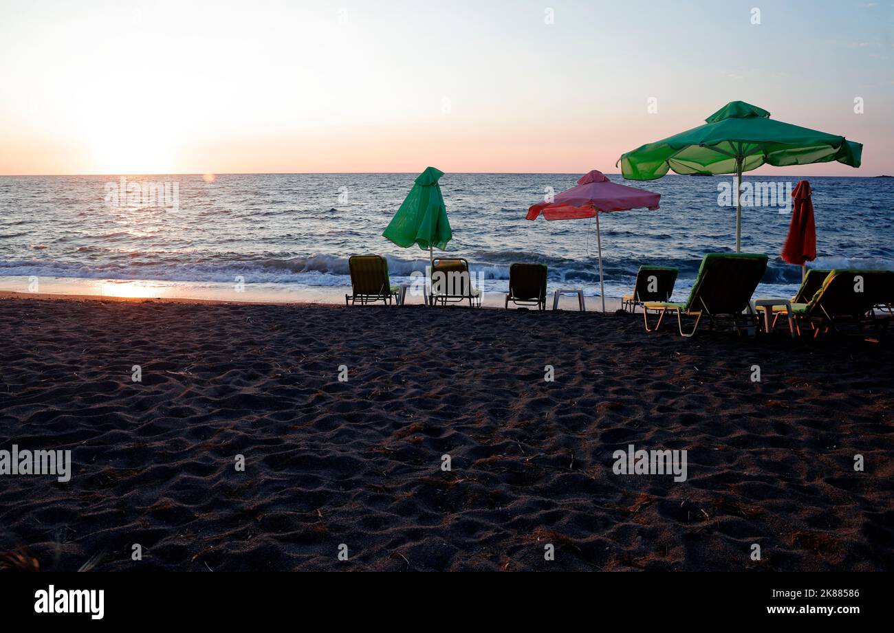Anaxos beach, Lesbos. Sunset and sunbeds. September / October 2022. Autumn. Stock Photo