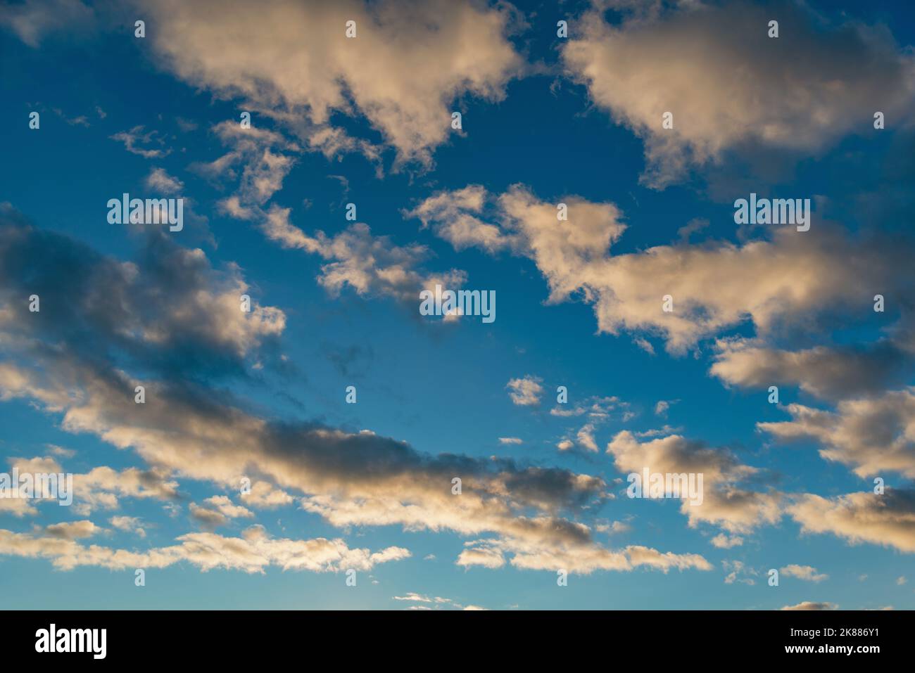 Amazing cloudscape on the sky at sunset time Stock Photo - Alamy