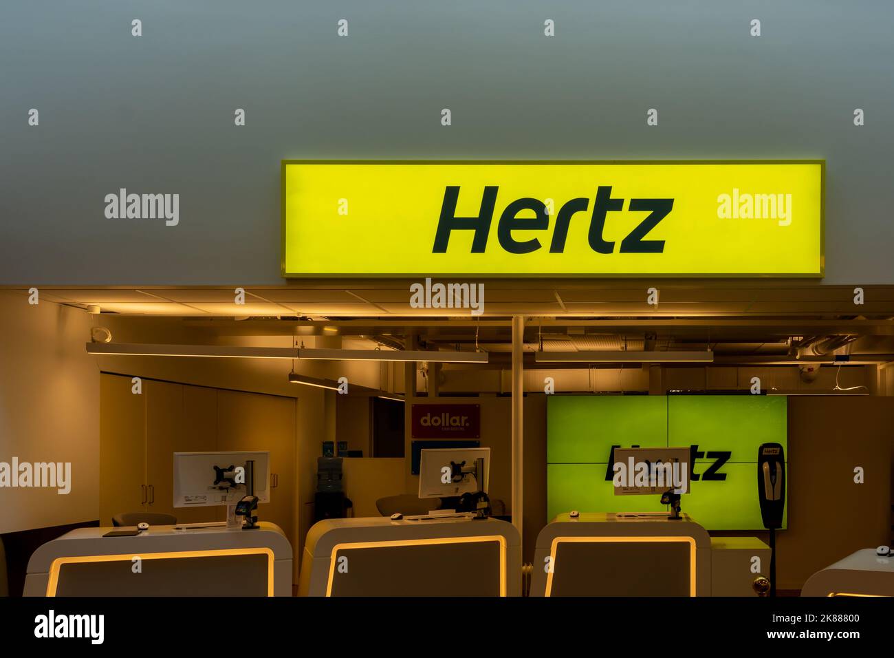 Oslo, Norway - September 28, 2022: A Hertz car rental counter at the airport. Stock Photo
