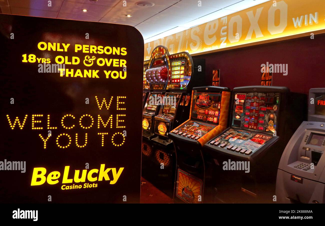 BeLucky Casino Slots cash prizes - We Welcome You - Only Persons 18yrs old & over - Thank You - High Street, Cheltenham, Gloucestershire, England, UK Stock Photo