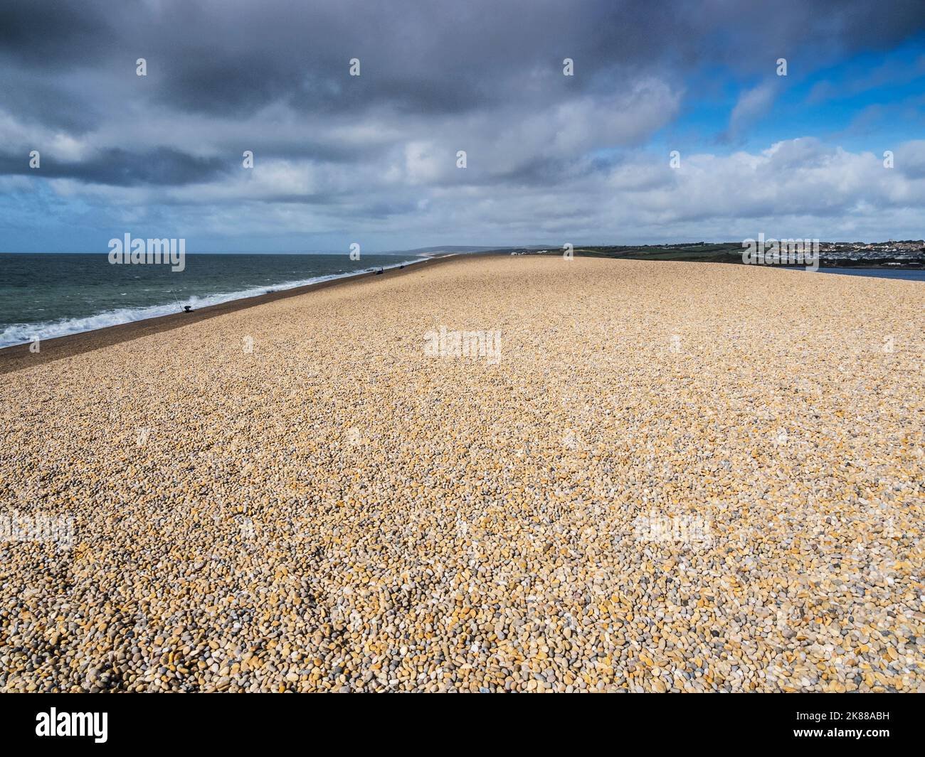 Storm clouds over Chesil Beach in Dorset Stock Photo Alamy