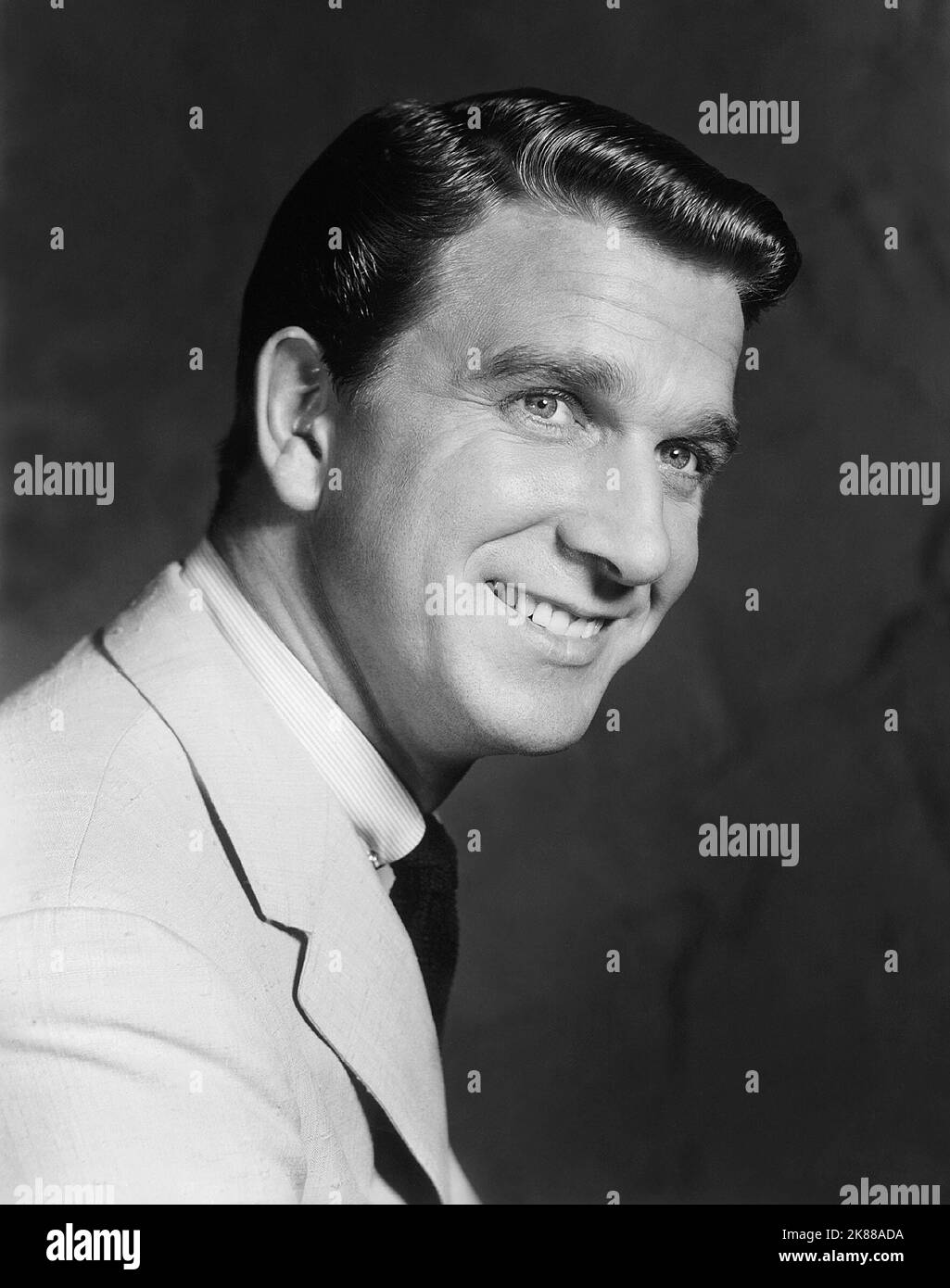 Leslie Nielsen  Actor   01 May 1957   **WARNING** This Photograph is for editorial use only and is the copyright of The Film Company and/or the Photographer assigned by the Film or Production Company and can only be reproduced by publications in conjunction with the promotion of the above Film. A Mandatory Credit To The Film Company is required. The Photographer should also be credited when known. No commercial use can be granted without written authority from the Film Company. Stock Photo