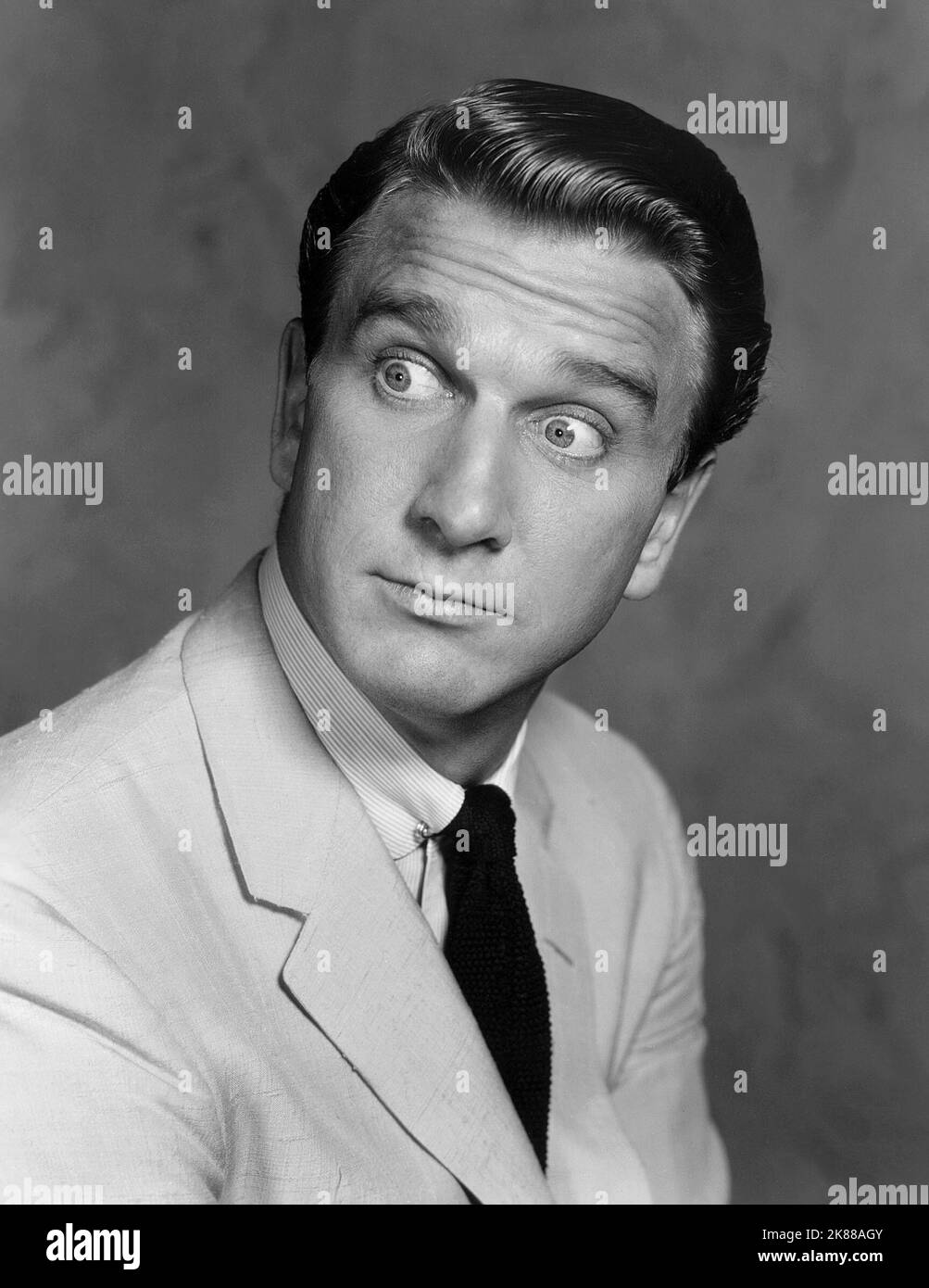 Leslie Nielsen  Actor   01 May 1957   **WARNING** This Photograph is for editorial use only and is the copyright of The Film Company and/or the Photographer assigned by the Film or Production Company and can only be reproduced by publications in conjunction with the promotion of the above Film. A Mandatory Credit To The Film Company is required. The Photographer should also be credited when known. No commercial use can be granted without written authority from the Film Company. Stock Photo