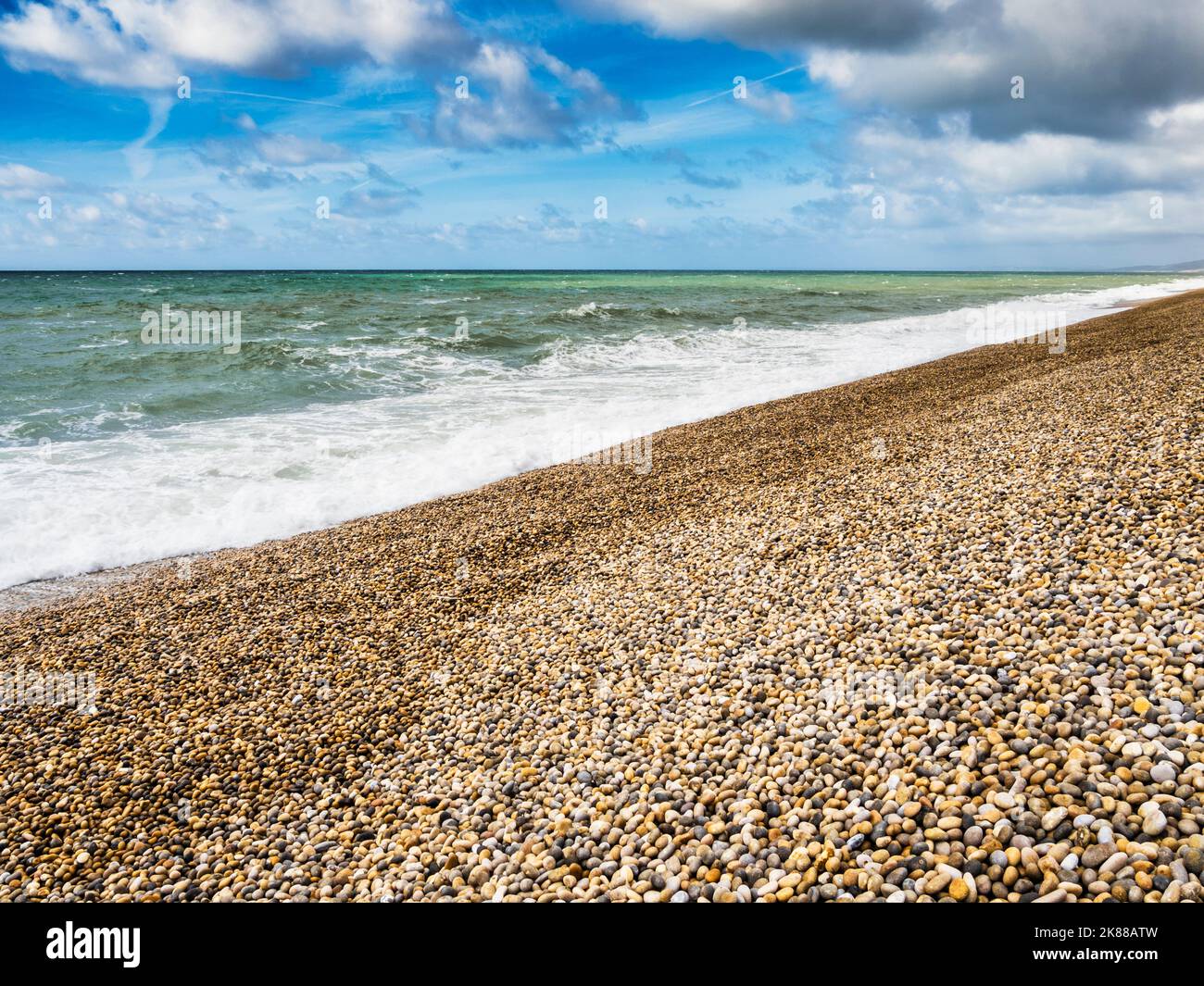 Storm clouds over Chesil Beach in Dorset. Stock Photo