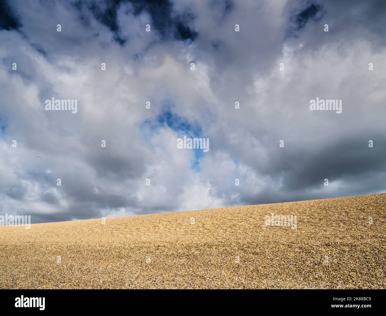 Storm clouds over Chesil Beach in Dorset. Stock Photo
