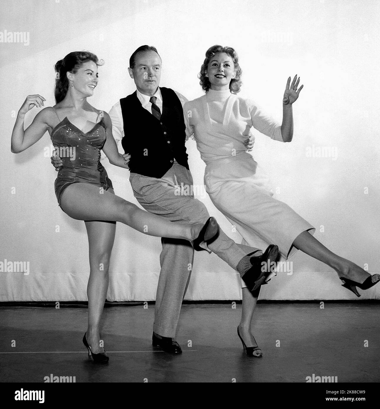 Sheree North, Bob Hope & Rhonda Fleming  Actress & Actor   01 May 1956   **WARNING** This Photograph is for editorial use only and is the copyright of The Film Company and/or the Photographer assigned by the Film or Production Company and can only be reproduced by publications in conjunction with the promotion of the above Film. A Mandatory Credit To The Film Company is required. The Photographer should also be credited when known. No commercial use can be granted without written authority from the Film Company. Stock Photo