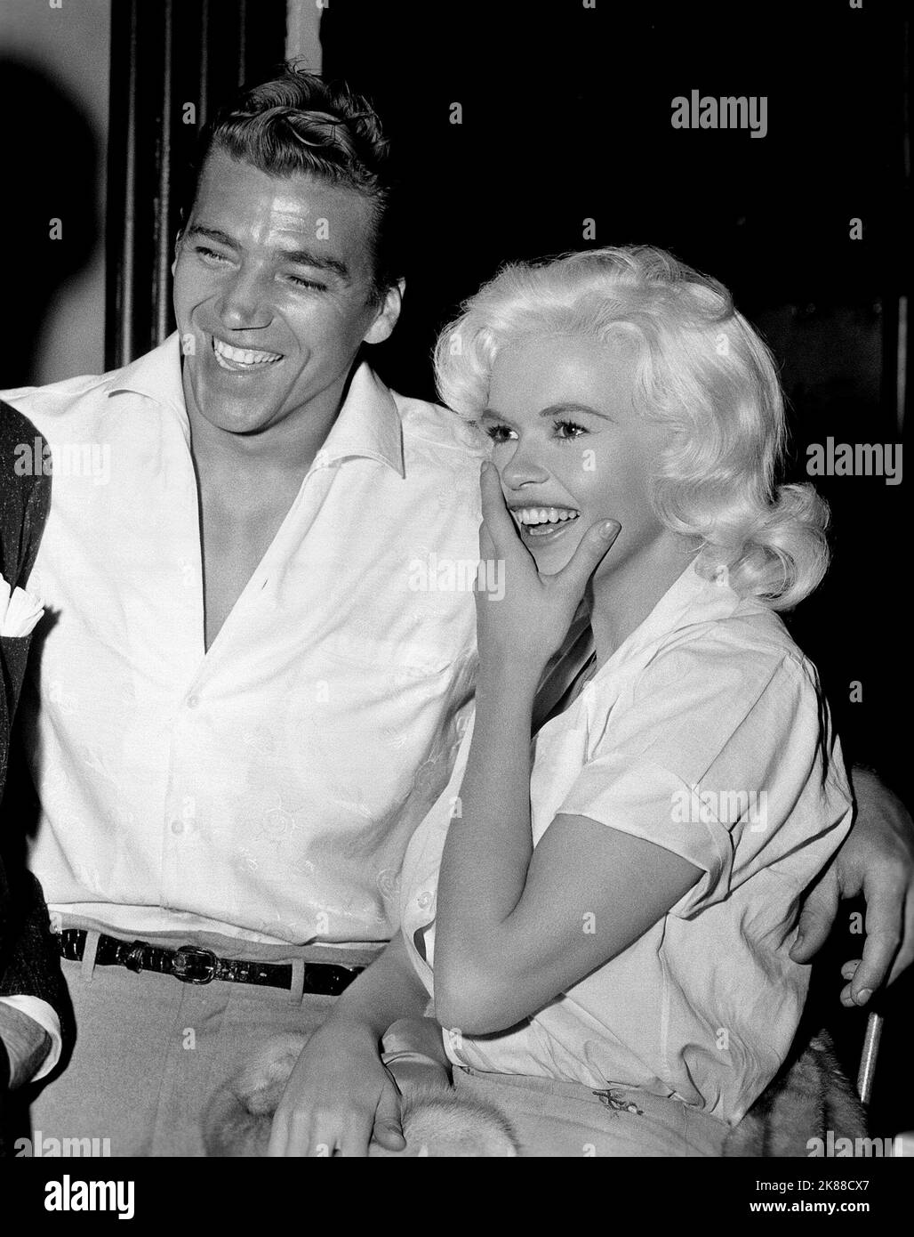 Mickey Hargitay & Jayne Mansfield  Actress And Husband   01 May 1957   **WARNING** This Photograph is for editorial use only and is the copyright of The Film Company and/or the Photographer assigned by the Film or Production Company and can only be reproduced by publications in conjunction with the promotion of the above Film. A Mandatory Credit To The Film Company is required. The Photographer should also be credited when known. No commercial use can be granted without written authority from the Film Company. Stock Photo