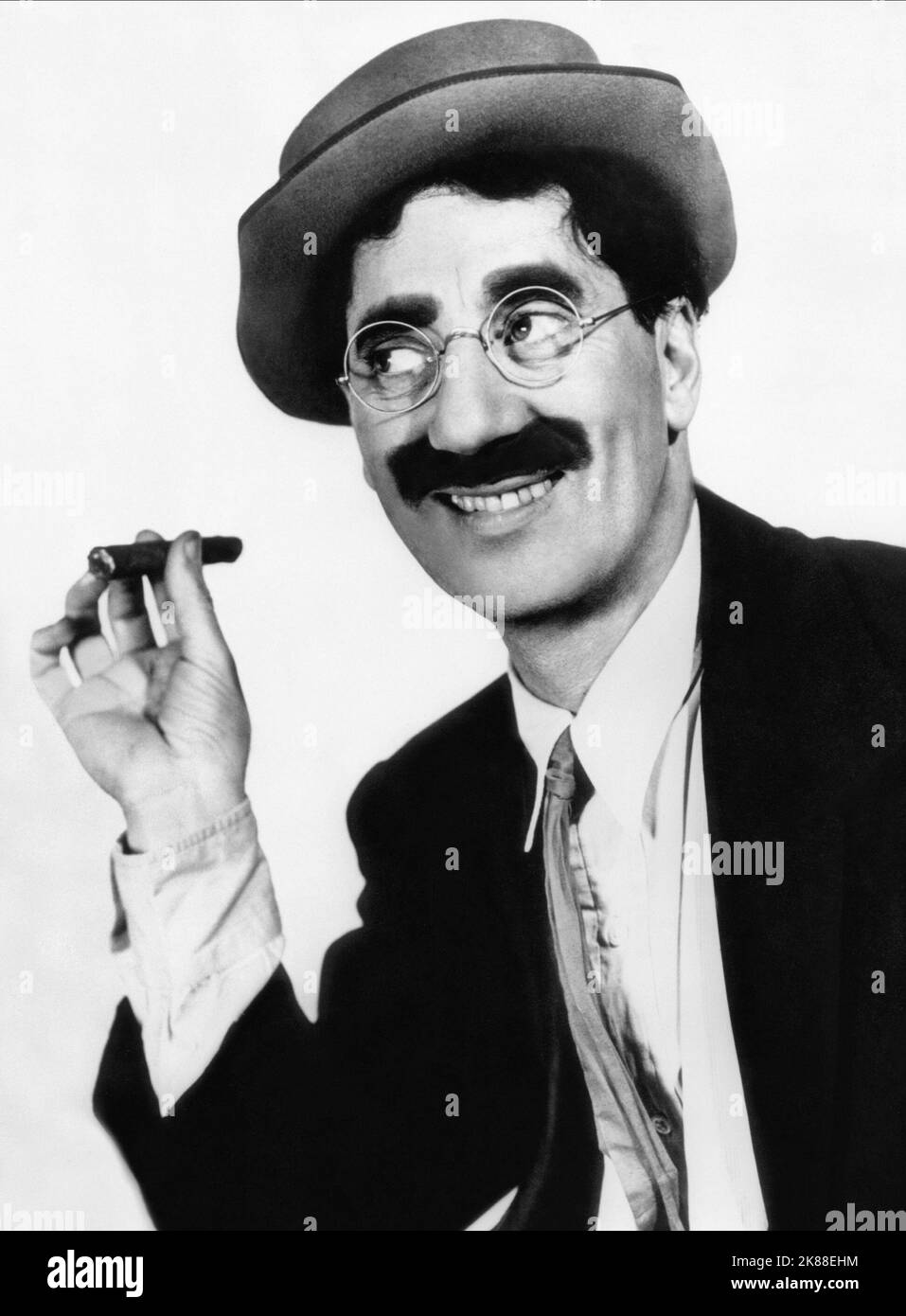 Groucho Marx  Actor, Marx Brother   06 December 1940   **WARNING** This Photograph is for editorial use only and is the copyright of The Film Company and/or the Photographer assigned by the Film or Production Company and can only be reproduced by publications in conjunction with the promotion of the above Film. A Mandatory Credit To The Film Company is required. The Photographer should also be credited when known. No commercial use can be granted without written authority from the Film Company. Stock Photo