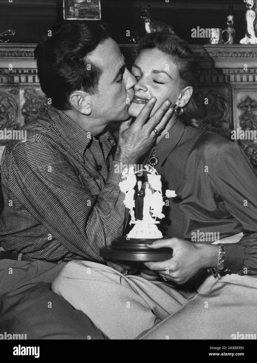 Lauren Bacall And Humphrey Bogart Kiss