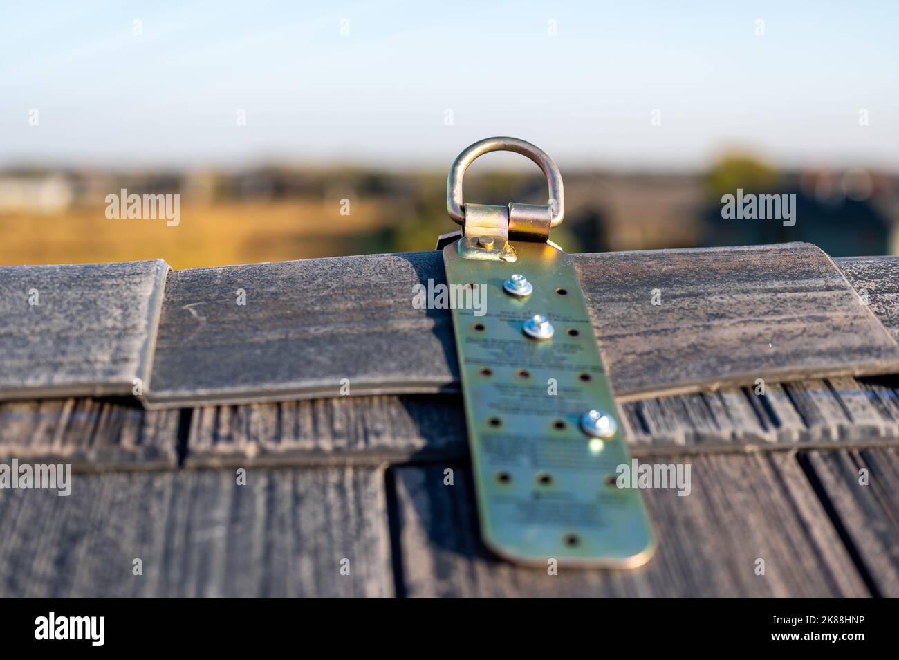 Selective focus on a metal temporary anchor installed on the peak of a