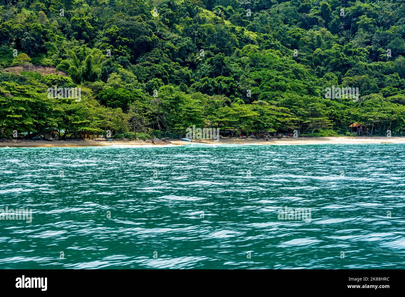 Paradise beach surrounded by rainforest in Trindade, municipality of Paraty, Rio de Janeiro Stock Photo