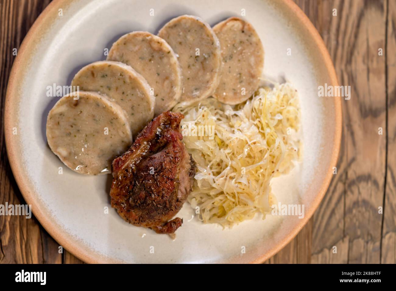 pork meat with sauerkraut and carlsbad dumplings Stock Photo Alamy