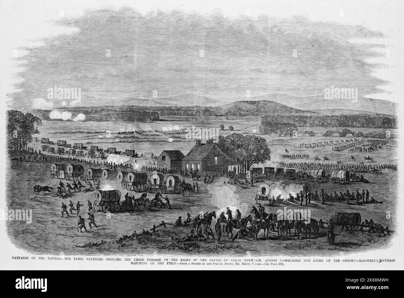 Campaign on the Rapidan - The Rebel batteries shelling the Union position on the night of the Battle of Cedar Mountain, August 9th, 1862 - Wounded men lying on the ground - Irvin McDowell's division marching on the field. 19th century American Civil War illustration from Frank Leslie's Illustrated Newspaper Stock Photo