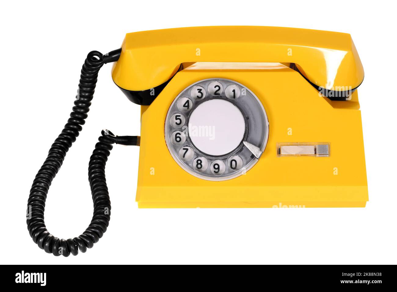 Yellow rotary dial telephone isolated over white background Stock Photo Alamy