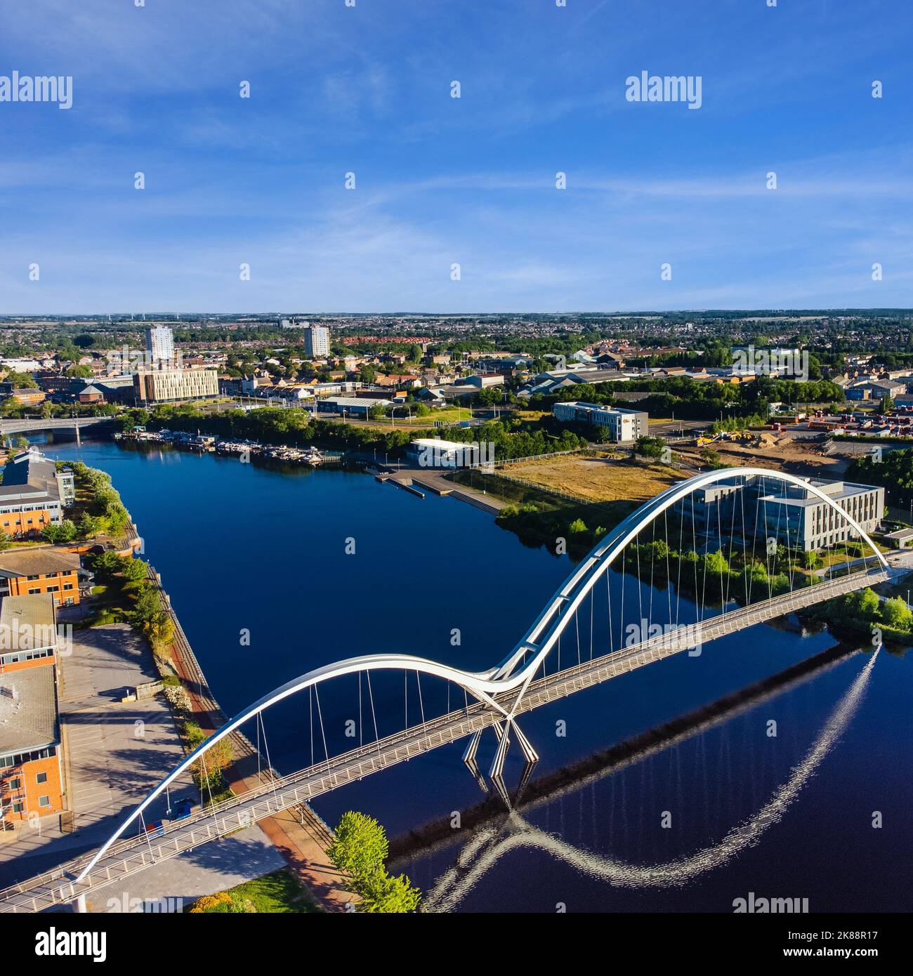 An aerial view of the Infinity Bridge spanning the river Tees in An aerial view of the Infinity Bridge spanning the river Tees in