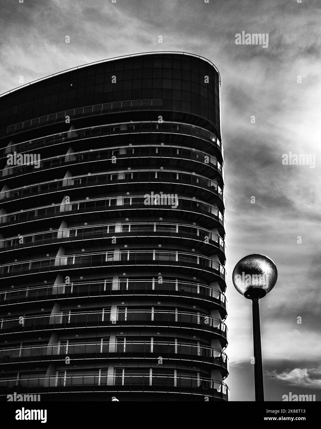 A vertical grayscale shot of a skyscraper Stock Photo - Alamy