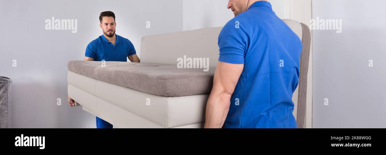 Furniture Mover At Home. Couch Delivery Service Stock Photo Alamy