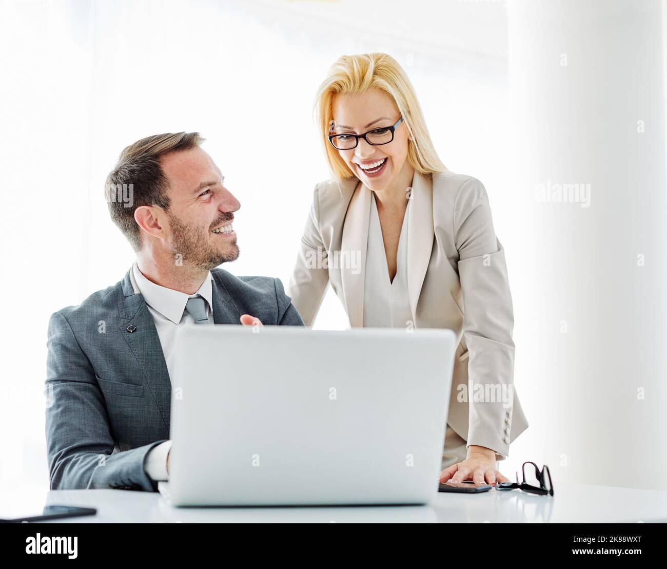 young business people meeting office teamwork group success corporate discussion laptop Stock Photo