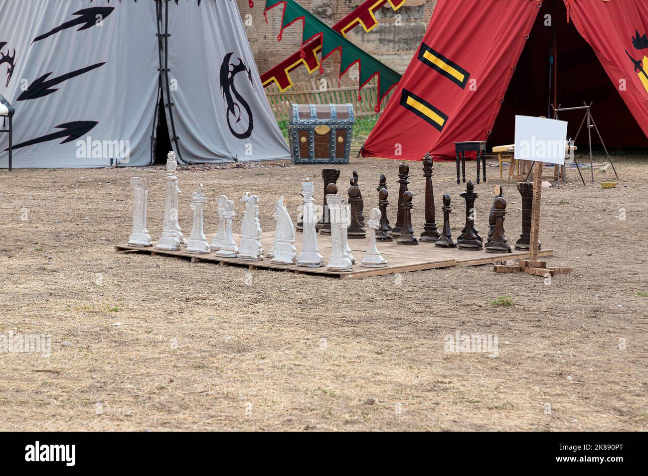 horizontal-view-of-a-wooden-big-chess-inside-a-medieval-military-camp