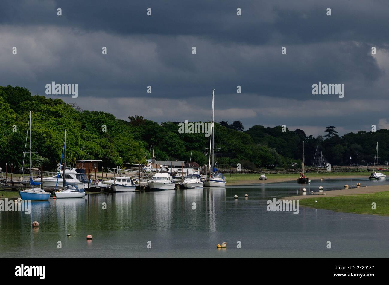 Boats at low tide, Wootton Creek, Wootton, Bridge, Isle of Wight, Hampshire, UK Stock Photo