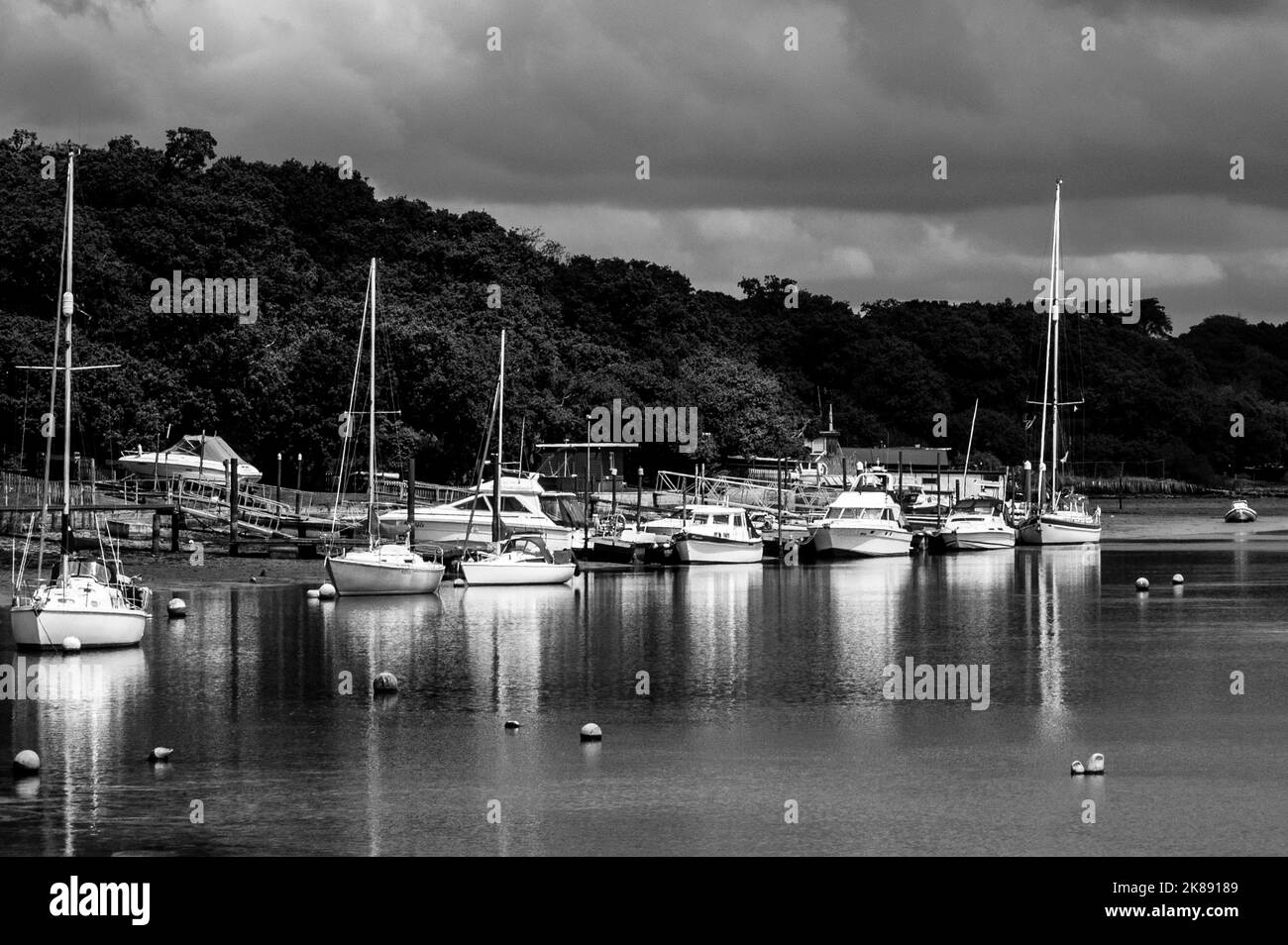 Boats at low tide, Wootton Creek, Wootton, Bridge, Isle of Wight, Hampshire, UK Stock Photo