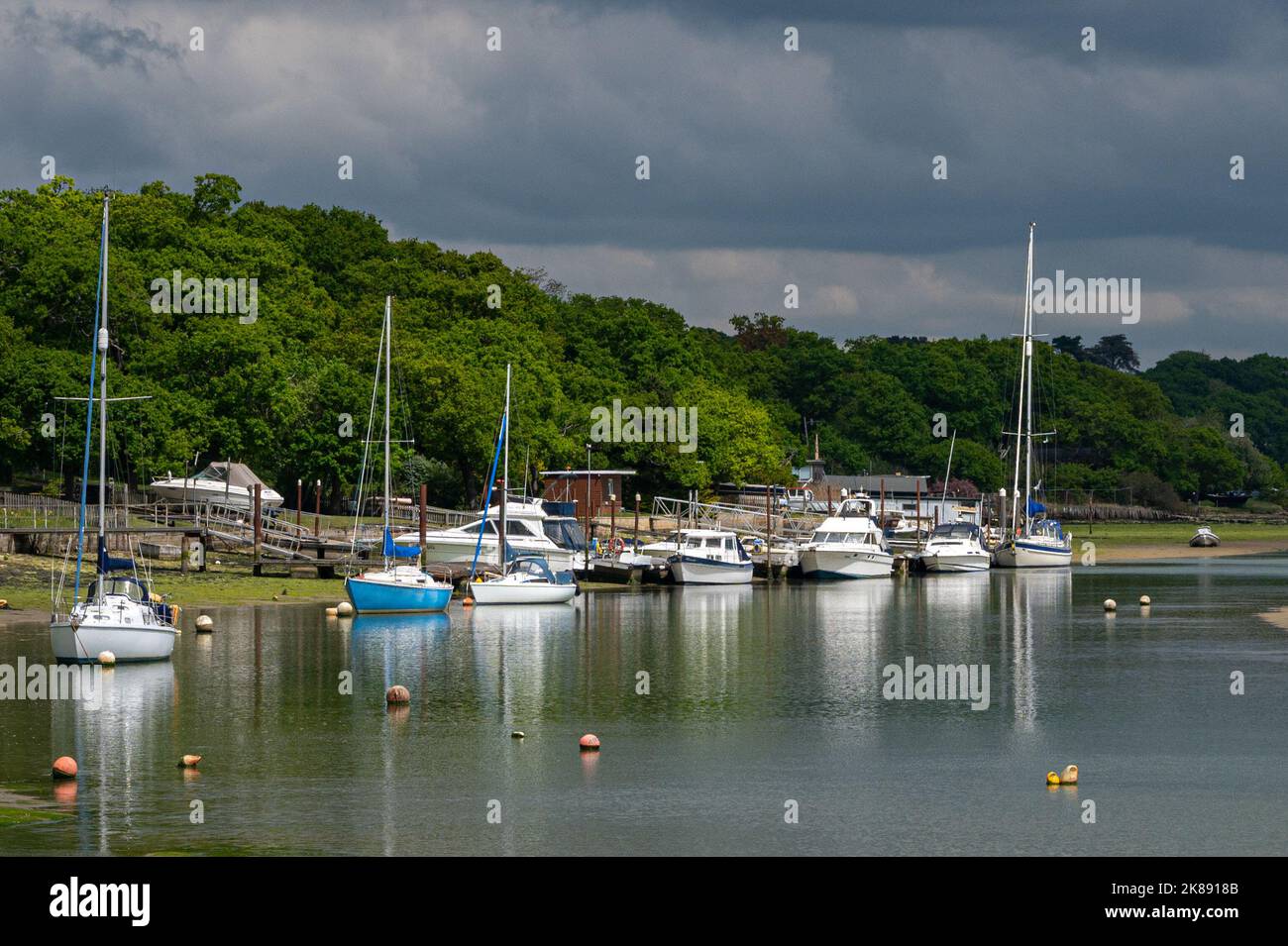 Boats at low tide, Wootton Creek, Wootton, Bridge, Isle of Wight, Hampshire, UK Stock Photo