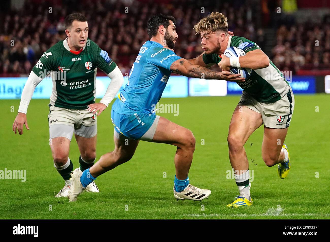 London Irish's Ollie Hassell-Collins is tackled by Gloucester Rugby's Giorgi Kveseldze during the Gallagher Premiership match at the Gtech Community Stadium, London. Picture date: Friday October 21, 2022. Stock Photo
