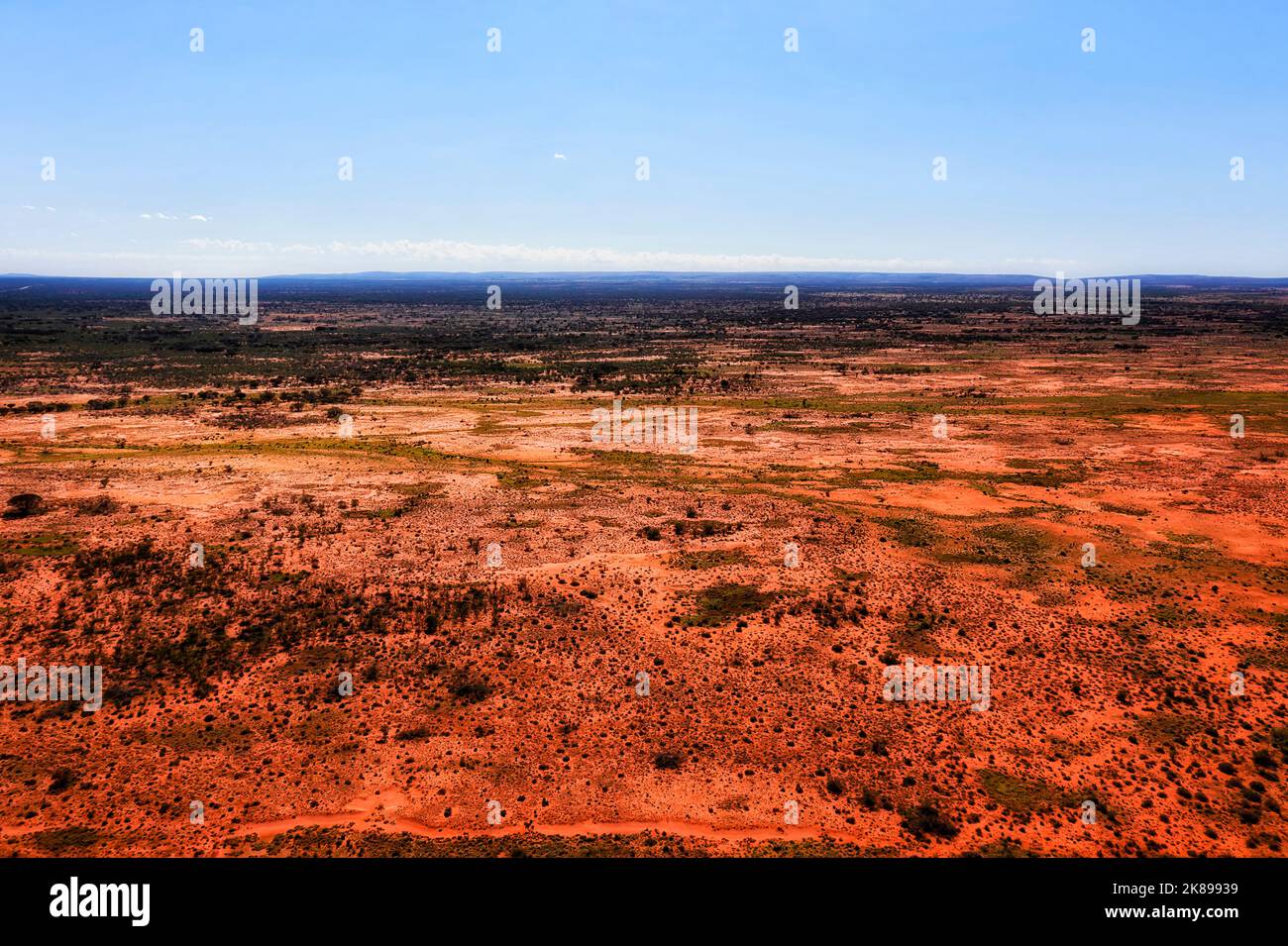 Endless plains of red soil semi-desert outback of Australia around Broken hill city on Barrier highway - aerial landscape. Stock Photo