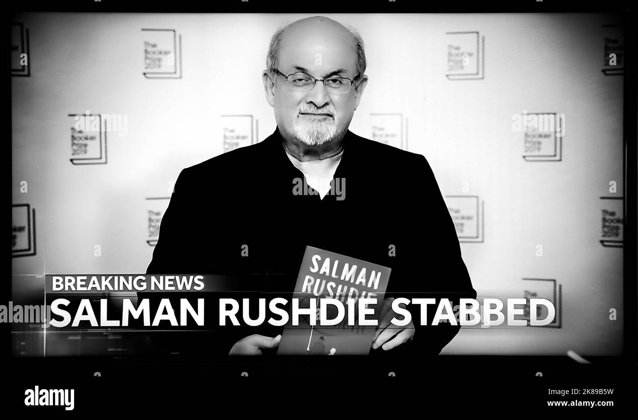 A television screen shot of a CNN news report on the knife attack on author Salman Rushdie. Stock Photo