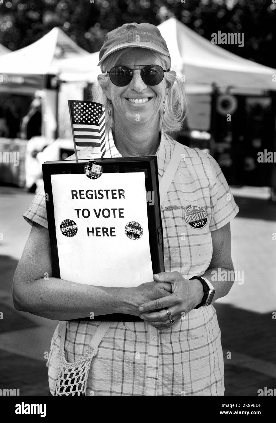 A volunteer signs up people wanting to register to vote in upcoming U.S. elections in Santa Fe, New Mexico Stock Photo