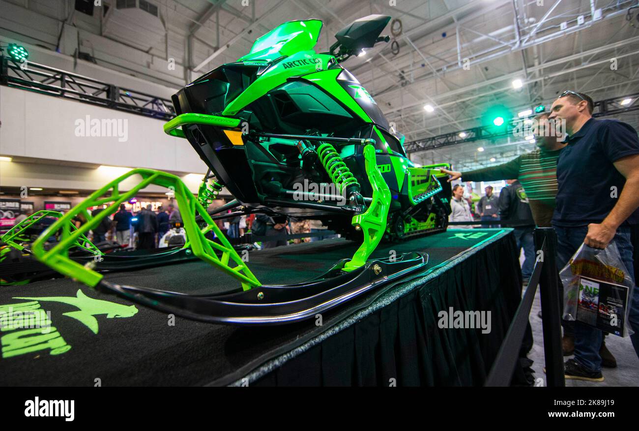 Mississauga, Canada. 21st Oct, 2022. People look at a snowmobile during