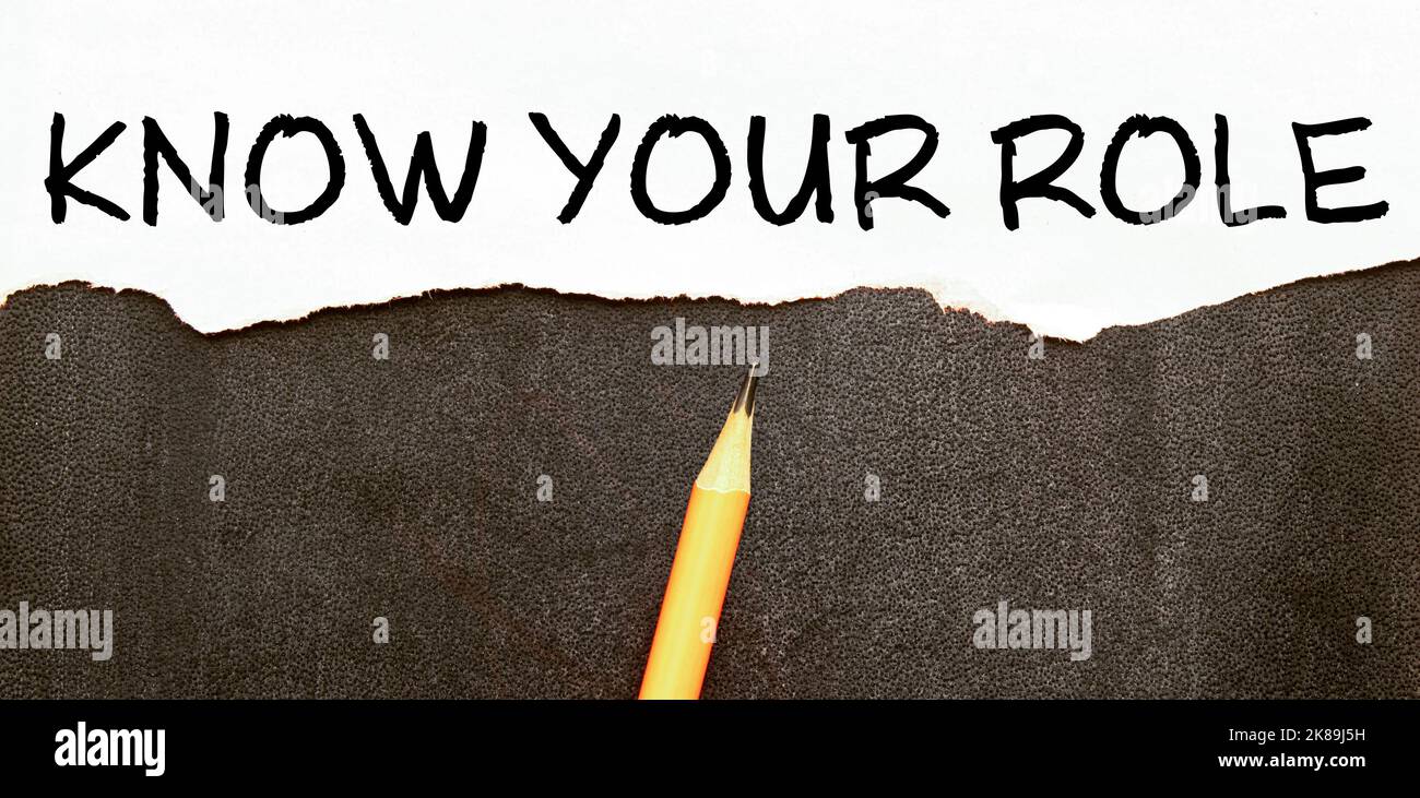 Text sign showing hand written words Know your role. Stock Photo
