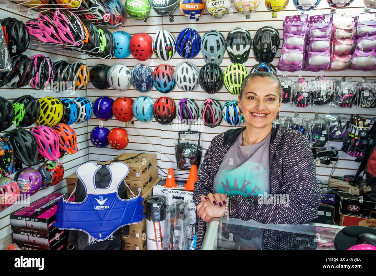 Bogota Colombia,Engativa Calle 63,bicycle safety helmets sale display sale retail stores business businesses shop shops market markets marketplace sel Stock Photo