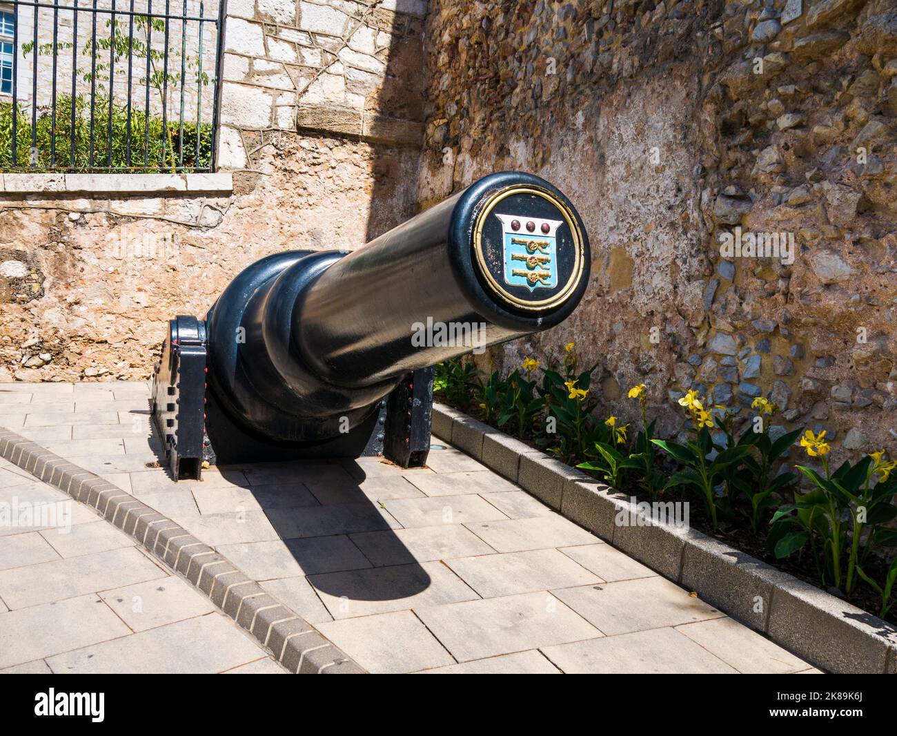 Artillery piece displaying a tampion with the Coat of Arms of the Royal Army Ordnance Corps is the 10-inch 18 ton gun at South Port Gate Gibraltar Stock Photo