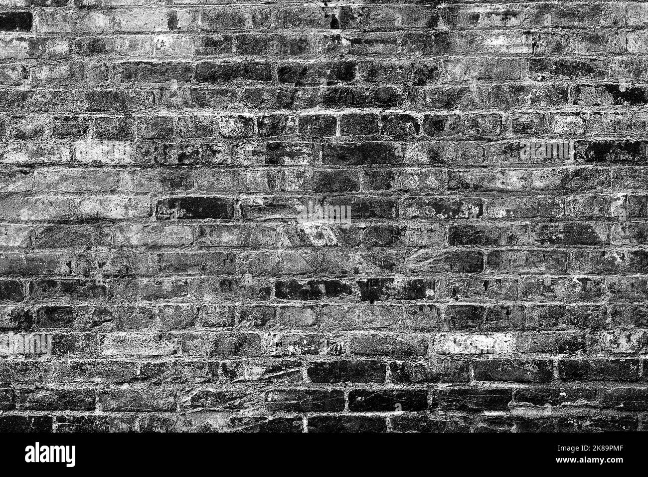horizontal part of black painted brick wall .Abstract Black brick wall