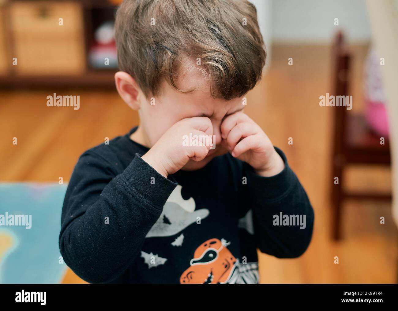 Young boy is upset and crying for some reason Stock Photo Alamy