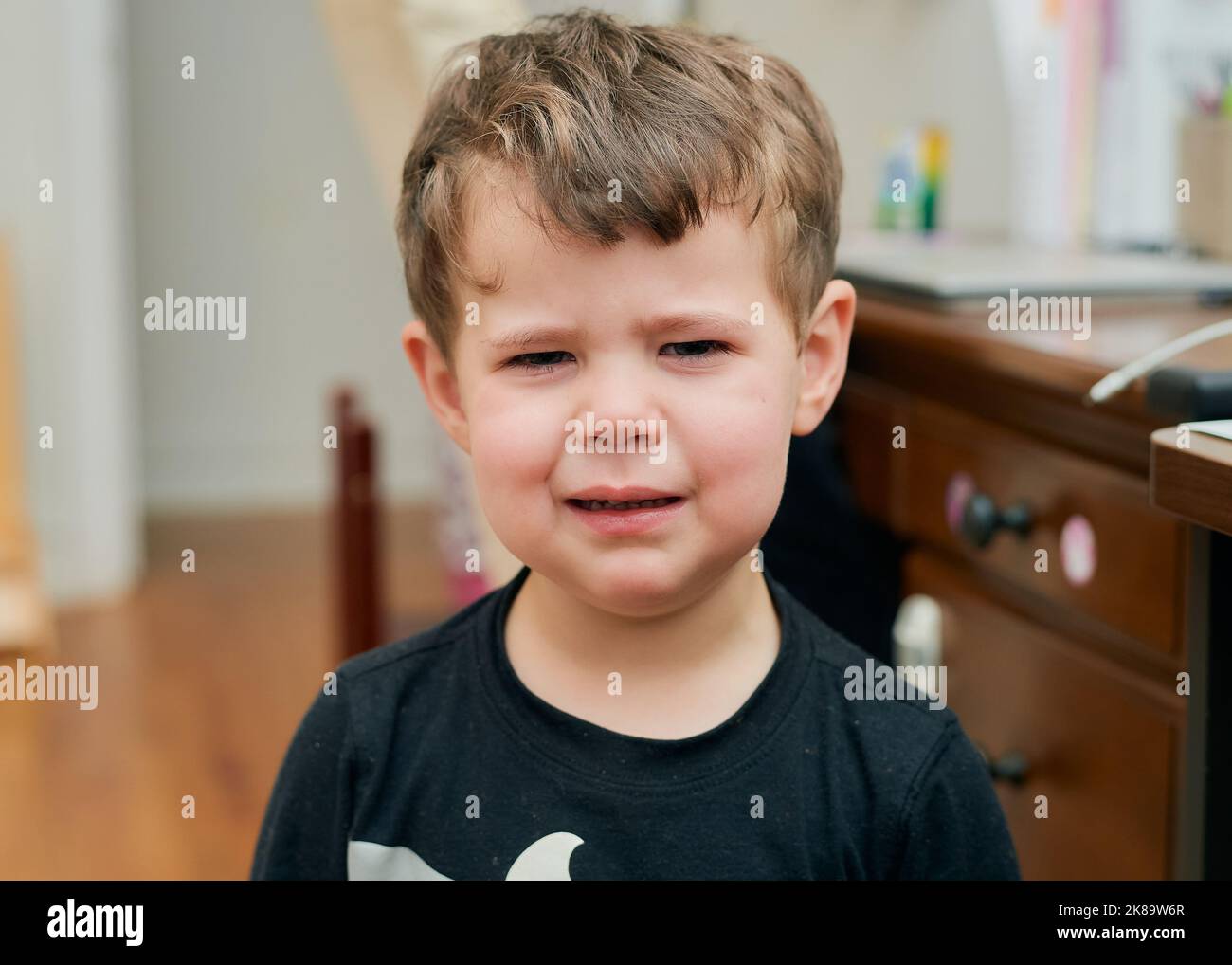 Young boy is upset and crying for some reason Stock Photo Alamy