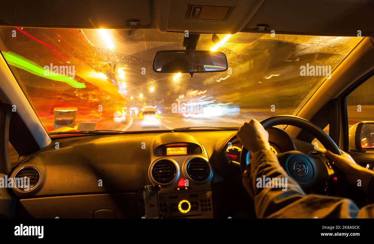 File photo dated 24/11/2014 of a man driving a car in traffic at night. Almost a quarter of suspected drug drivers who avoided justice due to forensic testing delays were potential repeat offenders, figures have revealed. A total of 444 cases were not progressed because of testing and analysis delays since October 2019 an increase of 60 since the previous 384 cases were reported. Issue date: Saturday October 22, 2022. Stock Photo